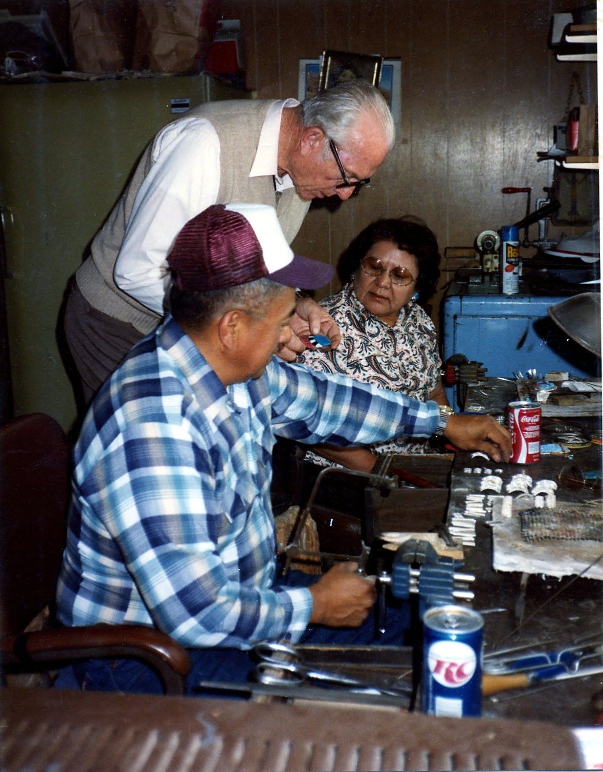Bernice and Robert Leekya at their jewelry workbench with John W. Kennedy